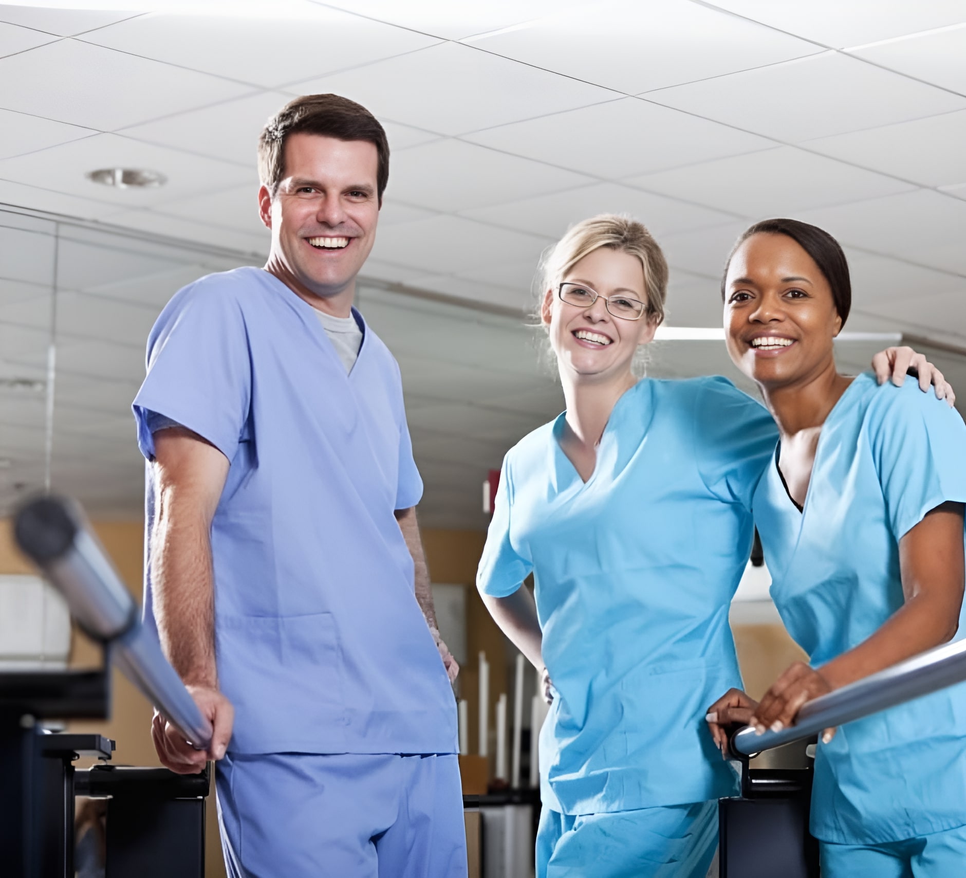 Join Our Team of Compassionate Care Professionals at Fresh Springs Care Our smiling healthcare professionals from Fresh Springs Care, proudly standing in a hospital corridor